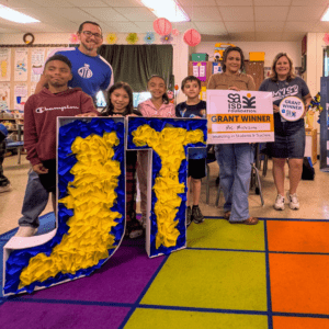 Students in a group picture with Grant Winner, Karyl Moctezuma