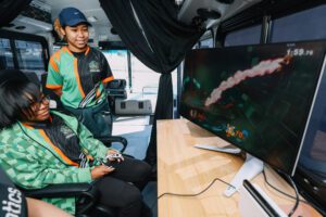 Students at Sam Houston High School enjoying eSports aboard the Pathfinder STEM bus