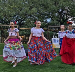 Bonham Academy folklorico dancers performing at Legacy Park