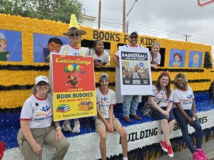 Book Buddies Bus Float in the Battle of Flowers Parade
