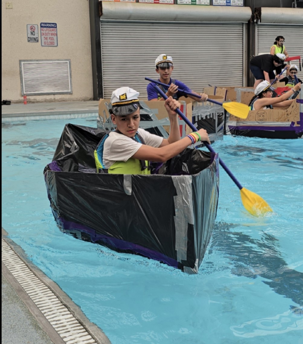 SAISD middle school students test cardboard boats during the district's first Cardboard Boat Regatta.